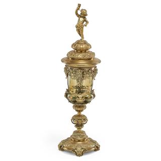 Appraisal: GILT BRONZE AND ENAMELED GLASS POKAL Large amber glass pokal