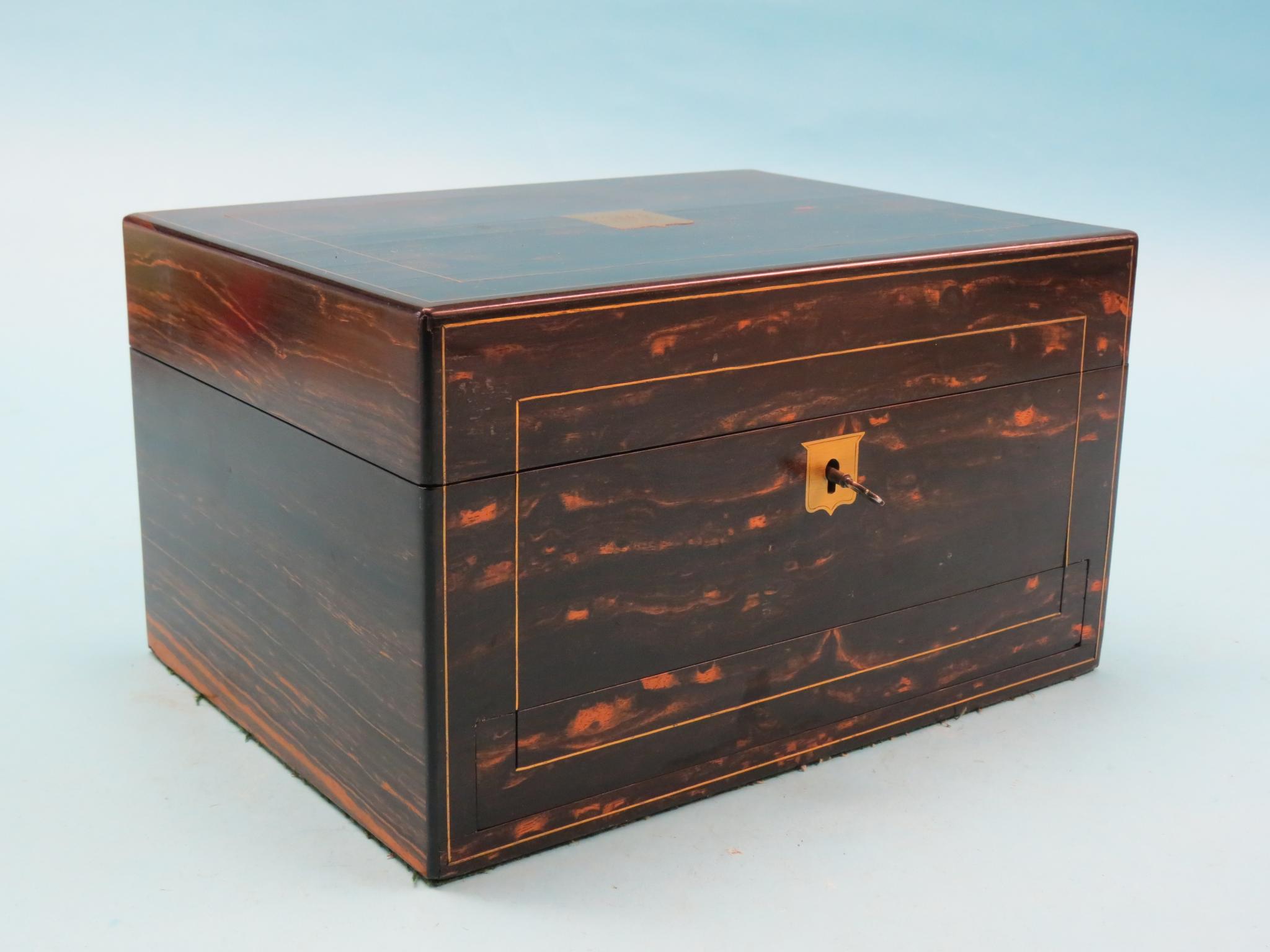 Appraisal: A Victorian coromandel vanity case interior containing an arrangement of