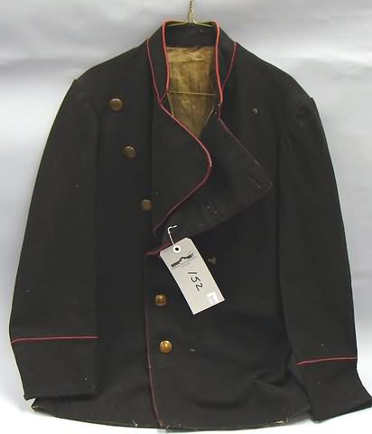 Appraisal: Lot consists of a short black wool jacket cut in