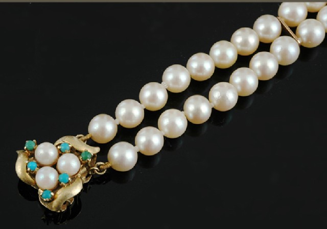 Appraisal: A cultured pearl and turquoise bracelet The double row of