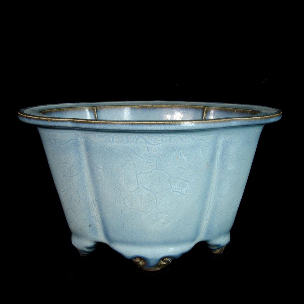 Appraisal: CHINESE TURQUOISE GLAZED LOTUS FORM PLANTER Chinese turqouise glazed pottery