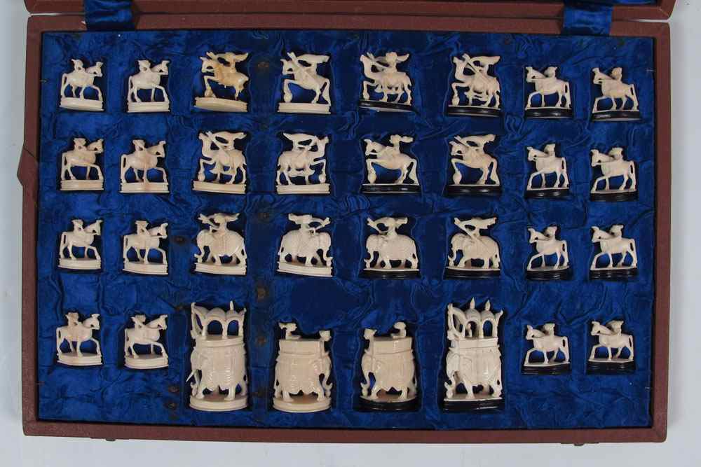 Appraisal: CHINESE CARVED IVORY CHESS SET Nicely carved with all pieces