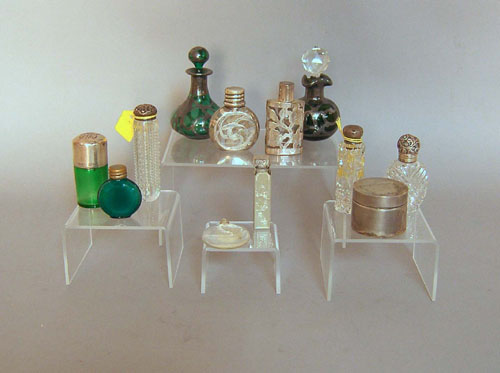 Appraisal: Four sterling silver overlay perfume bottles late th c together