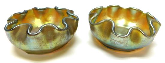 Appraisal: Pair Louis Comfort Tiffany Favrile master salt cellar bowls iridescent