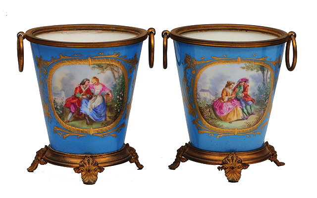 Appraisal: A PAIR OF FRENCH PORCELAIN GILT METAL MOUNTED CACHE POTS