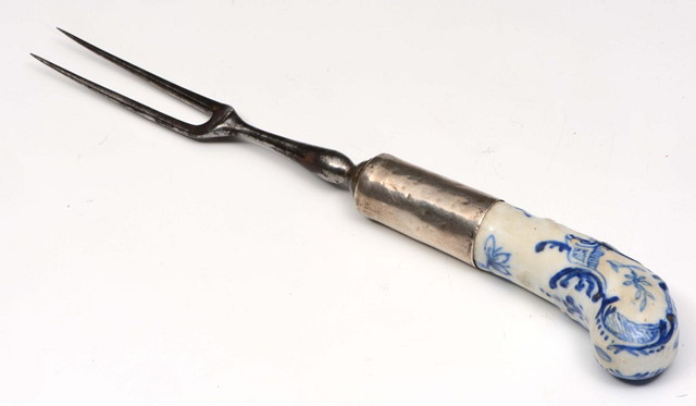 Appraisal: AN TH CENTURY PORCELAIN STEEL FORK with silver mount and