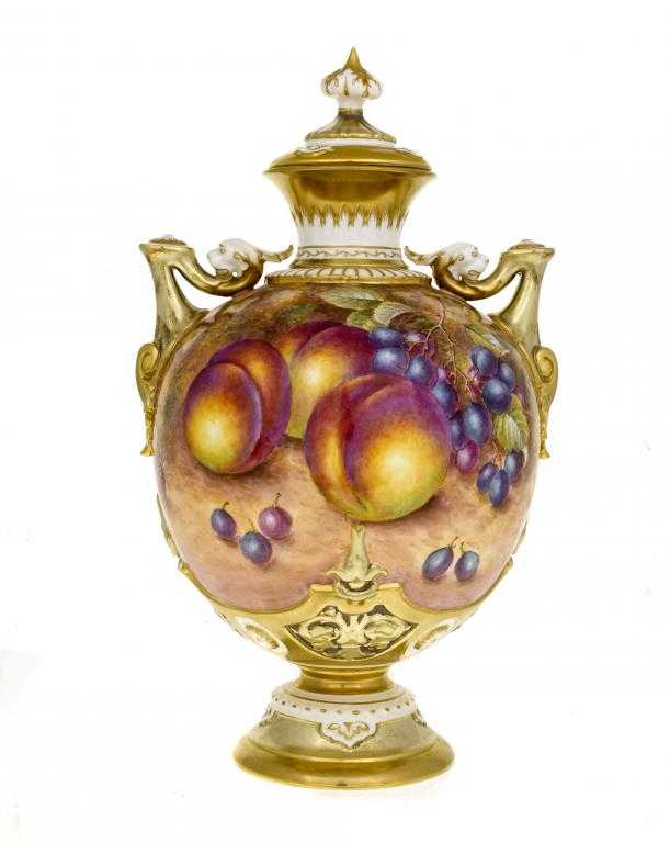 Appraisal: A ROYAL WORCESTER VASE AND COVER the globular vase painted