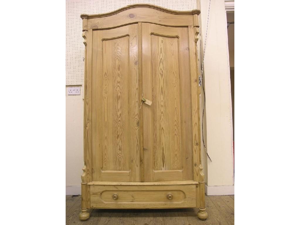 Appraisal: A th century French waxed pine armoire arched pediment above