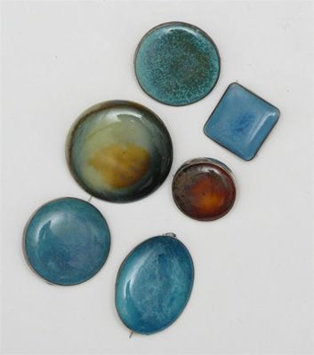 Appraisal: Five Ruskin Pottery stoneware brooches glazed in shades of green