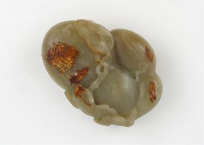 Appraisal: A pale russet coloured jade carving of two gourds issuing