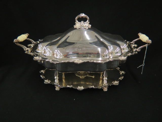 Appraisal: Silverplate Buffet Server covered with inset and burner footed base