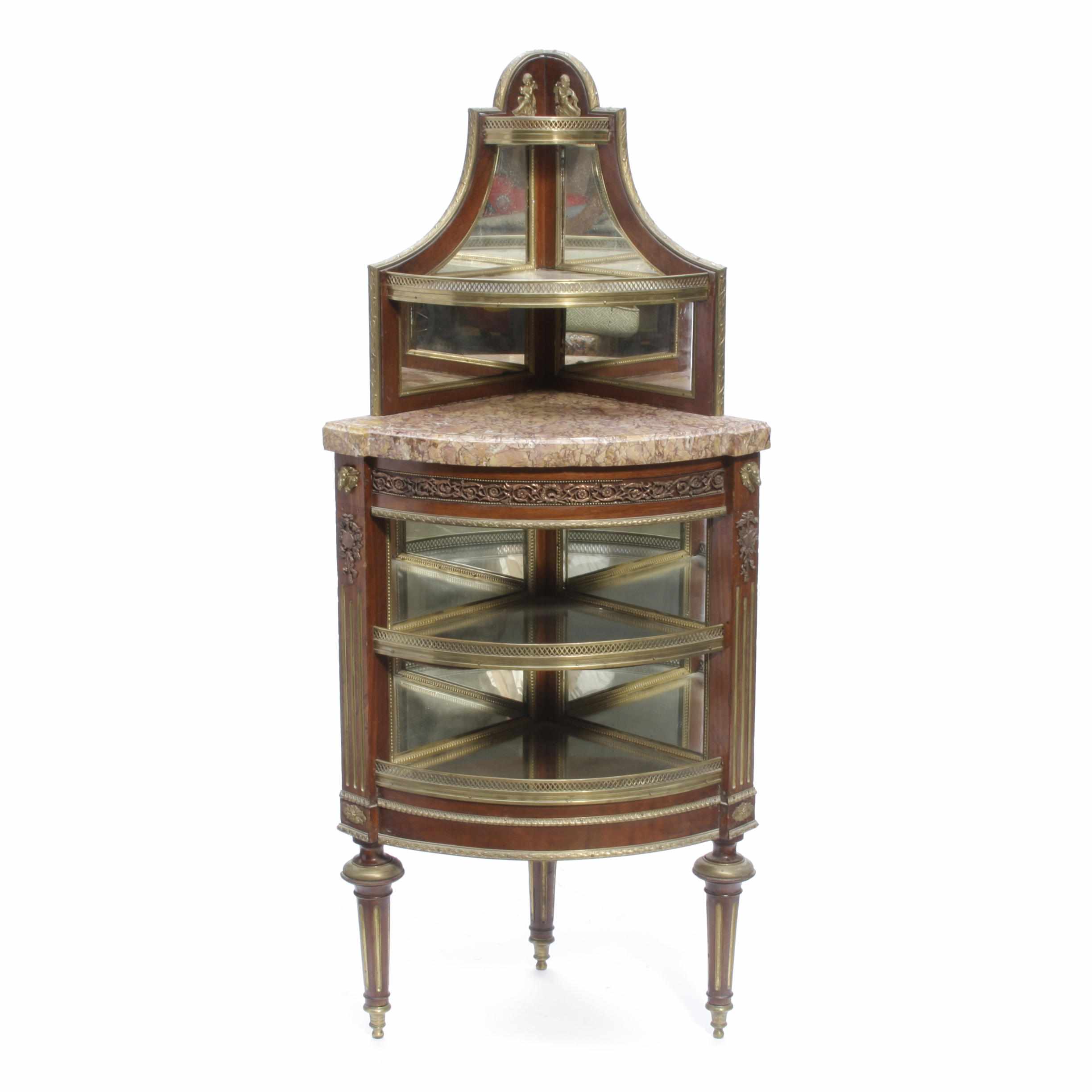 Appraisal: A Louis XVI style gilt bronze mounted mahogany encoignure height