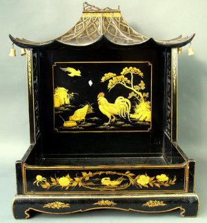 Appraisal: An early th century chinoiserie style table cellaret with galleried