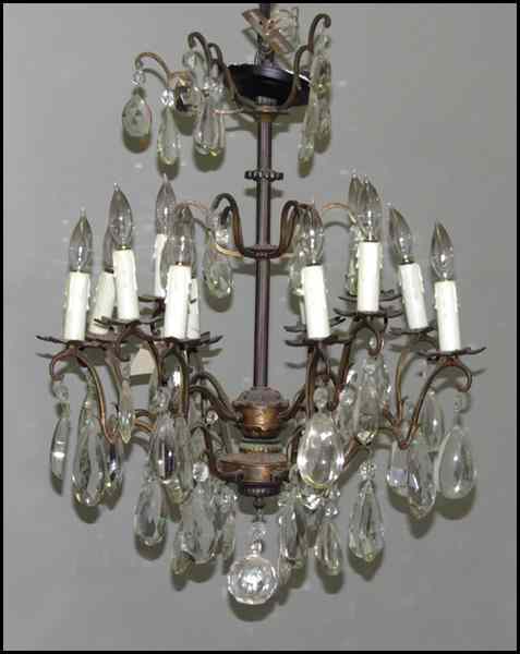 Appraisal: PATINATED BRONZE AND CRYSTAL TWELVE-LIGHT CHANDELIER '' x '' Condition