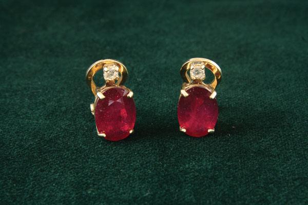 Appraisal: Pair of ruby and diamond Earrings ct gold each claw-set