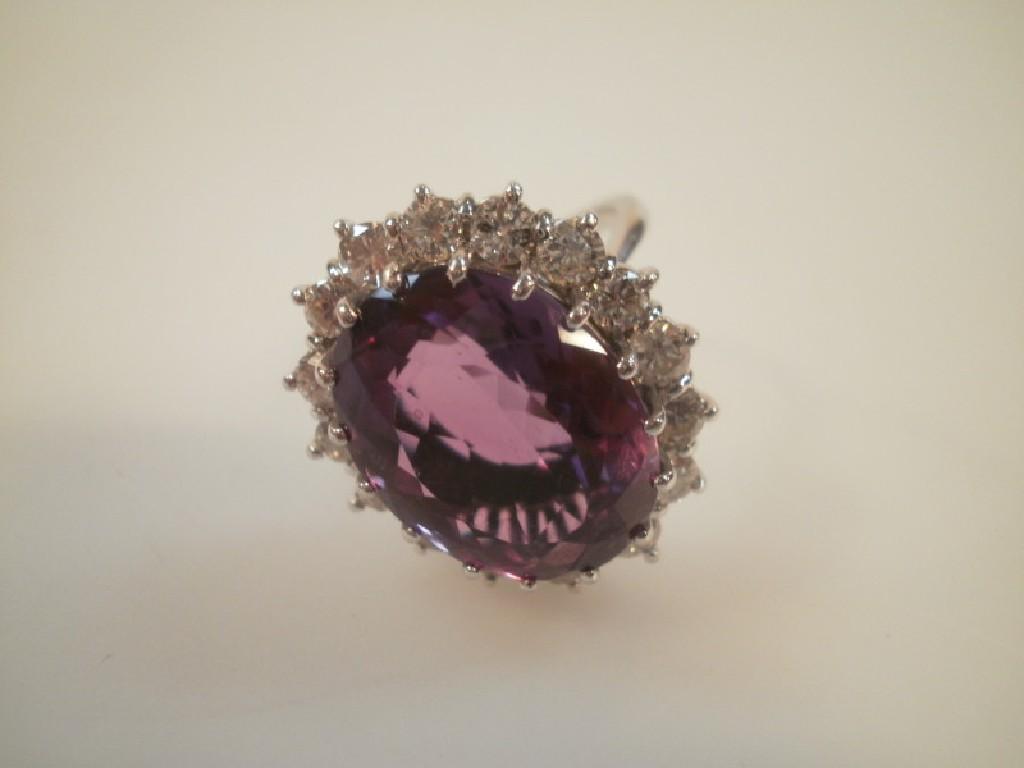 Appraisal: An amethyst and diamond ring the central amethyst of mm