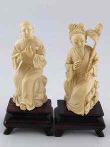 Appraisal: A pair of Chinese ivory figures the man playing a