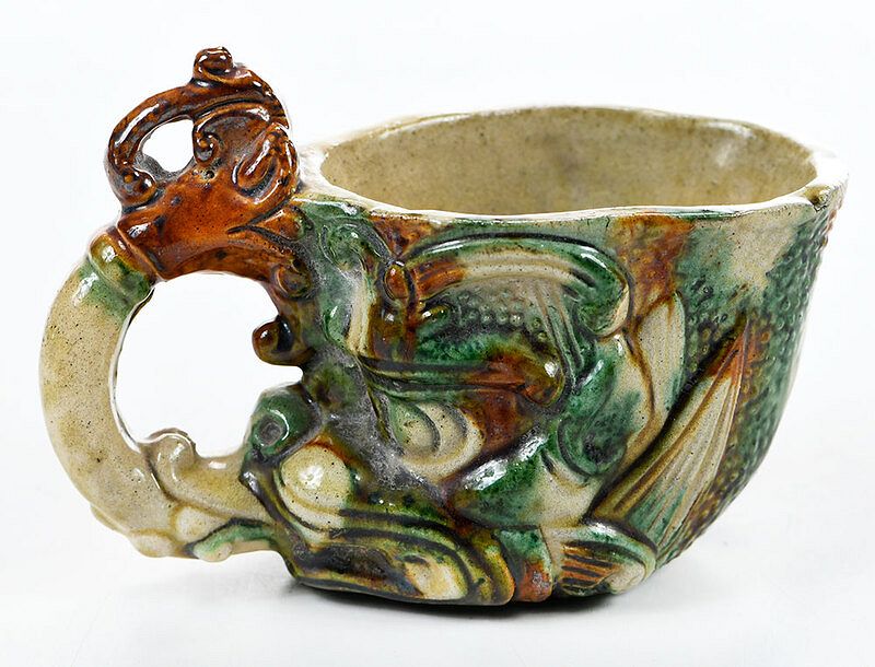 Appraisal: Chinese Sancai Glazed Pottery Rhyton Tang or Tang style molded