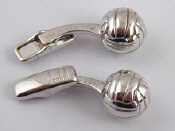 Appraisal: A pair of silver cufflinks by Dunhill designed as footballs