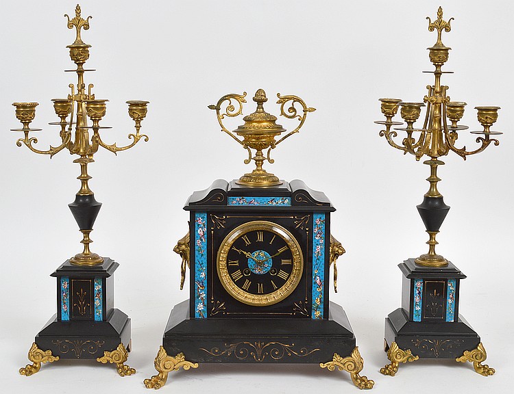 Appraisal: FRENCH BLACK MARBLE THREE-PIECE CLOCK GARNITURECirca Comprising a pair of