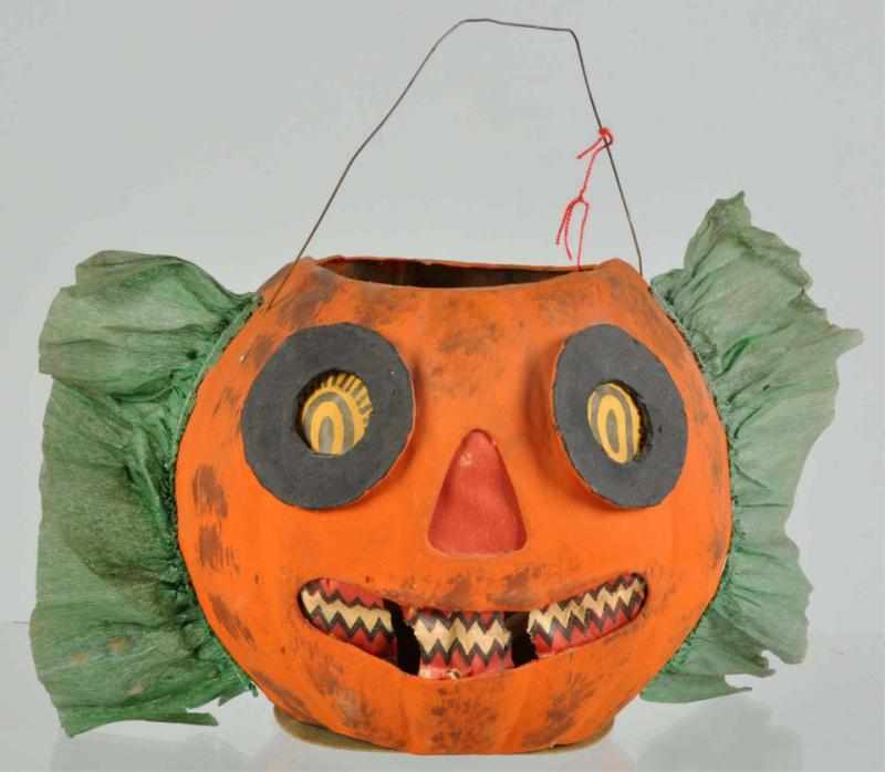 Appraisal: Halloween Jack-O-Lantern Pumpkin Description Green paper sides black discs around