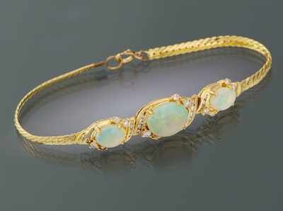 Appraisal: A Ladies' White Opal and Diamond Bracelet k yellow gold