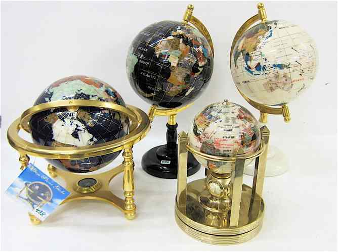 Appraisal: FOUR GEMSTONE DESK-TOP WORLD GLOBES including three '' diameter versions