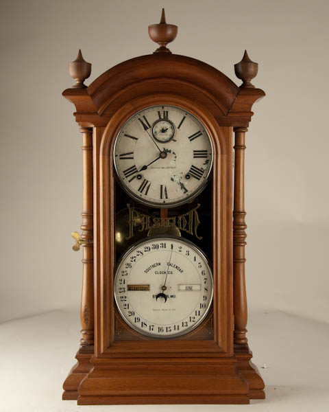 Appraisal: Fashion Clock Southern Calendar Clock Co dated walnut flaking to