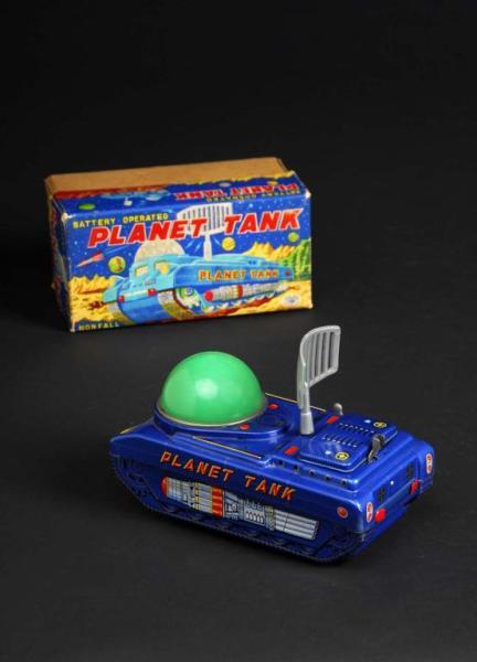 Appraisal: Tin Planet Tank Battery-Operated Toy Description Japanese Made by Nomura