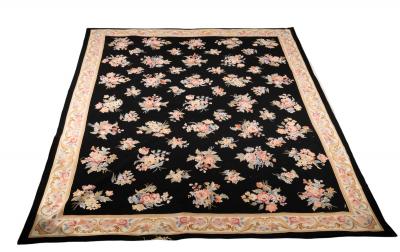 Appraisal: An Aubusson style wool carpet decorated a field of flower