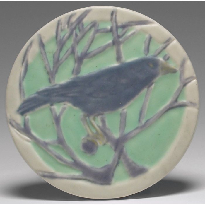 Appraisal: Rookwood trivet round with a bird and branches covered in