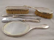 Appraisal: A silver dressing table set of mirror two brushes shoehorn