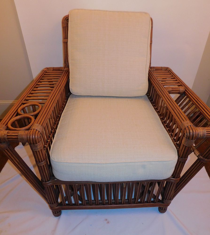 Appraisal: PALECEK RATTAN A C CHAIR OTTOMAN Vintage pole rattan Arts