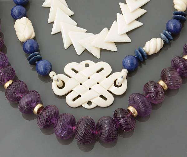 Appraisal: A collection of stone ivory and gold bead jewelry five