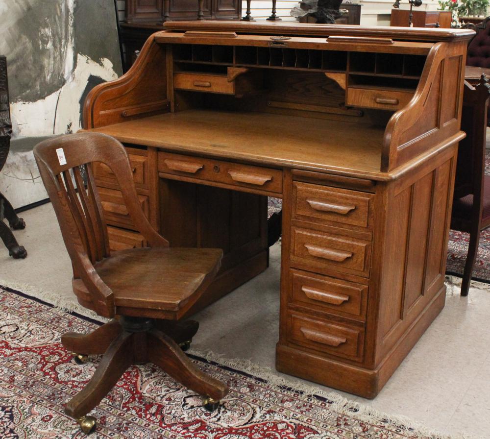 Appraisal: AN OAK ROLL-TOP DESK WITH CHAIR William Schwarzwaelder Co Chichester