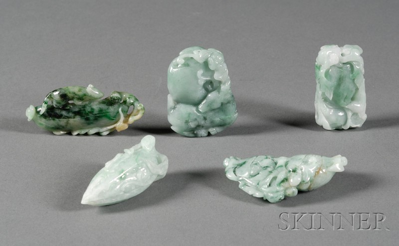 Appraisal: Five Jade Pendants green stones with bright areas carved as