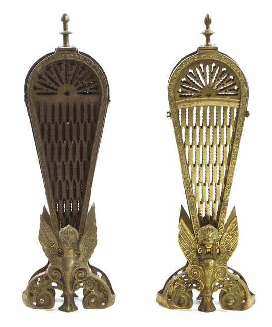 Appraisal: A Pair of Victorian Brass Fan-Form Fire Screens each cast