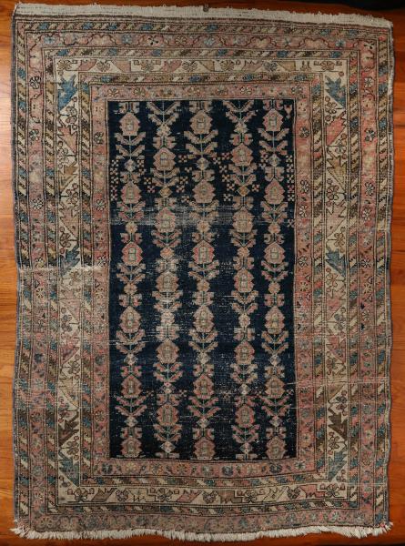 Appraisal: AN ANTIQUE PERSIAN HAMADAN SCATTER RUGThe blue field with overall