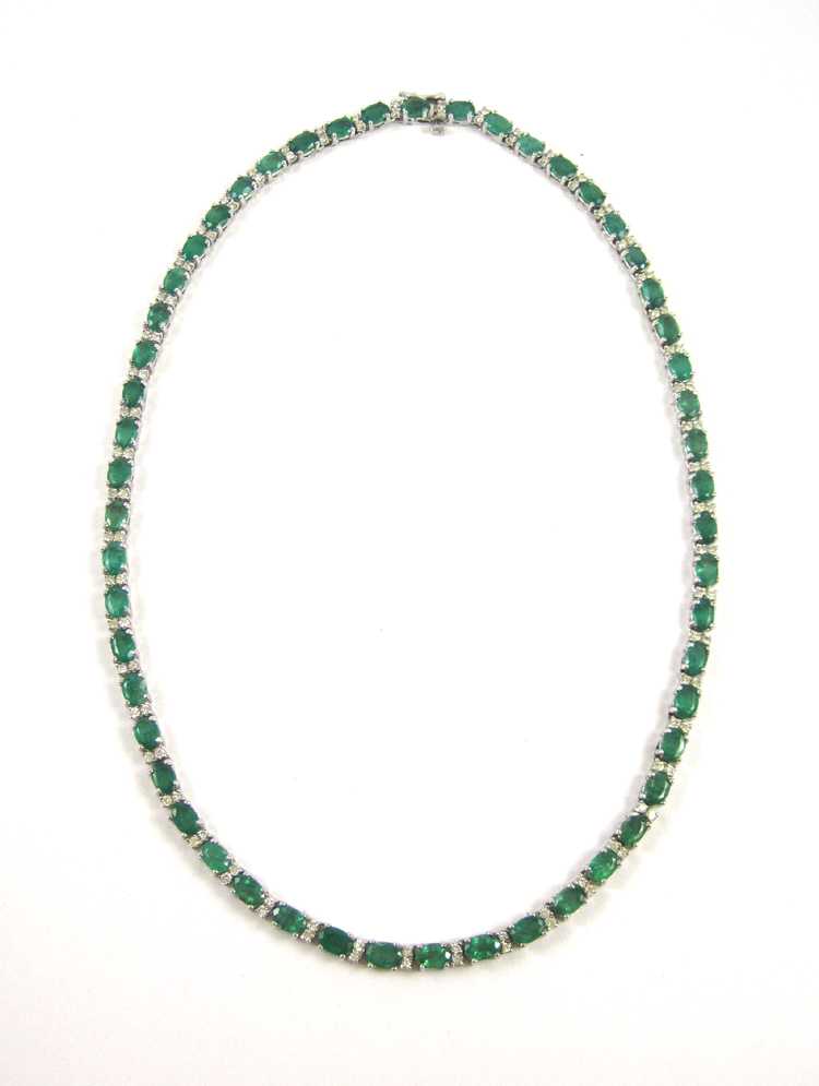 Appraisal: EMERALD AND FOURTEEN KARAT GOLD NECKLACE The white gold necklace