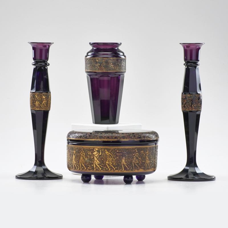 Appraisal: MOSER Pair candlesticks lidded box and vase in amethyst cameo