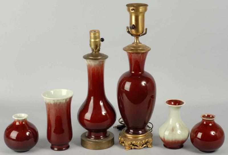 Appraisal: Lot of Catalina Two-Tone Pottery Vases Description All in oxblood