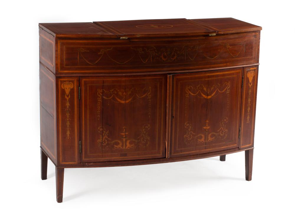 Appraisal: Edwardian Inlaid Mahogany Bowfront Cabinet c tripartite hinged top interior