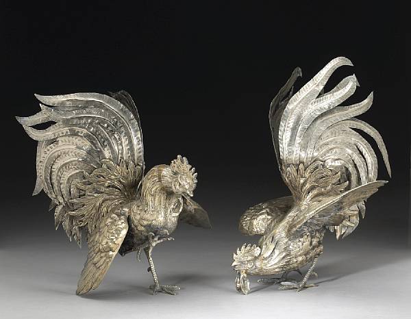 Appraisal: A pair of silverplated fighting cockerel figuresModern Assembled of cast