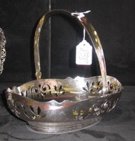 Appraisal: A HALLMARKED STERLING SILVER BASKET having an oval pierced shape