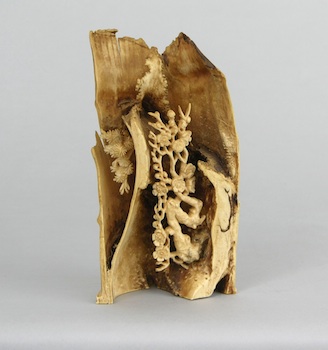 Appraisal: A Carved Ivory or Bone Floral Ornament A carved ivory