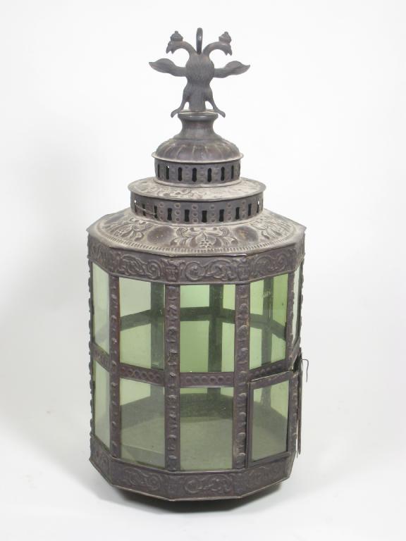 Appraisal: A large brass th Century pressed brass Lantern with bird