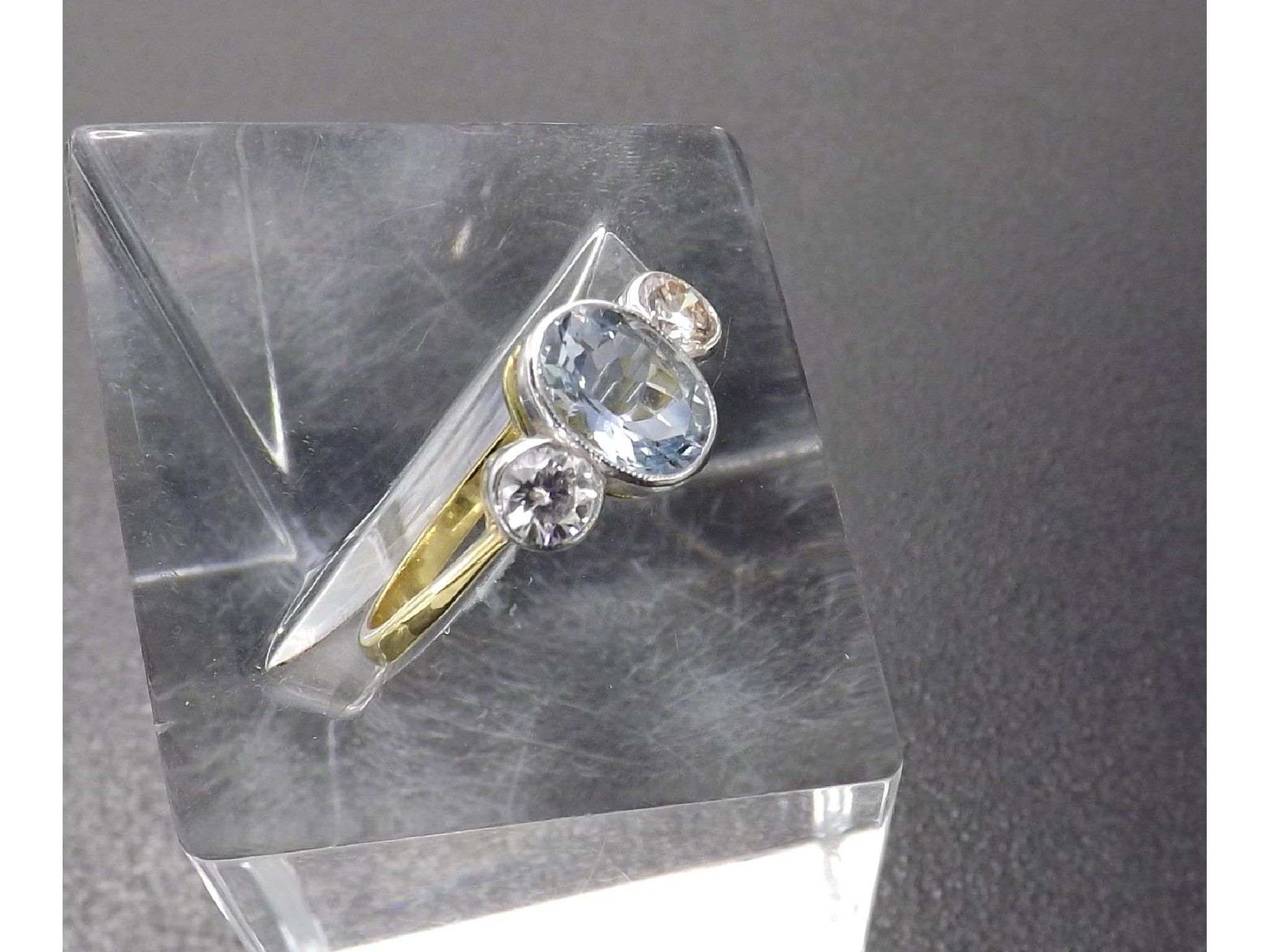 Appraisal: ct aquamarine and diamond three stone ring the oval cut