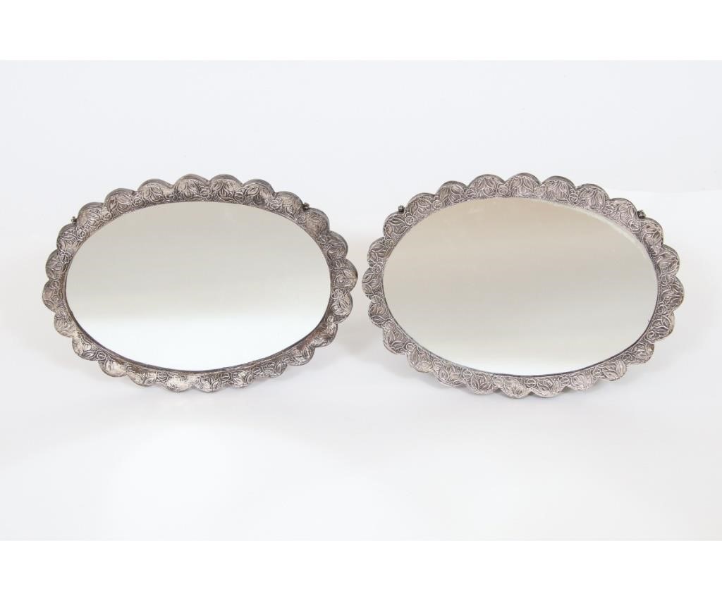 Appraisal: Pair of Turkish silver mirrors x each Condition Tarnished dents