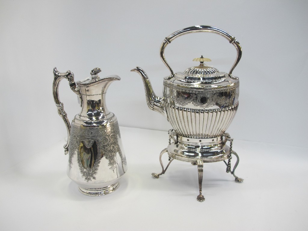 Appraisal: A lot comprising a silver plated spirit kettle on stand