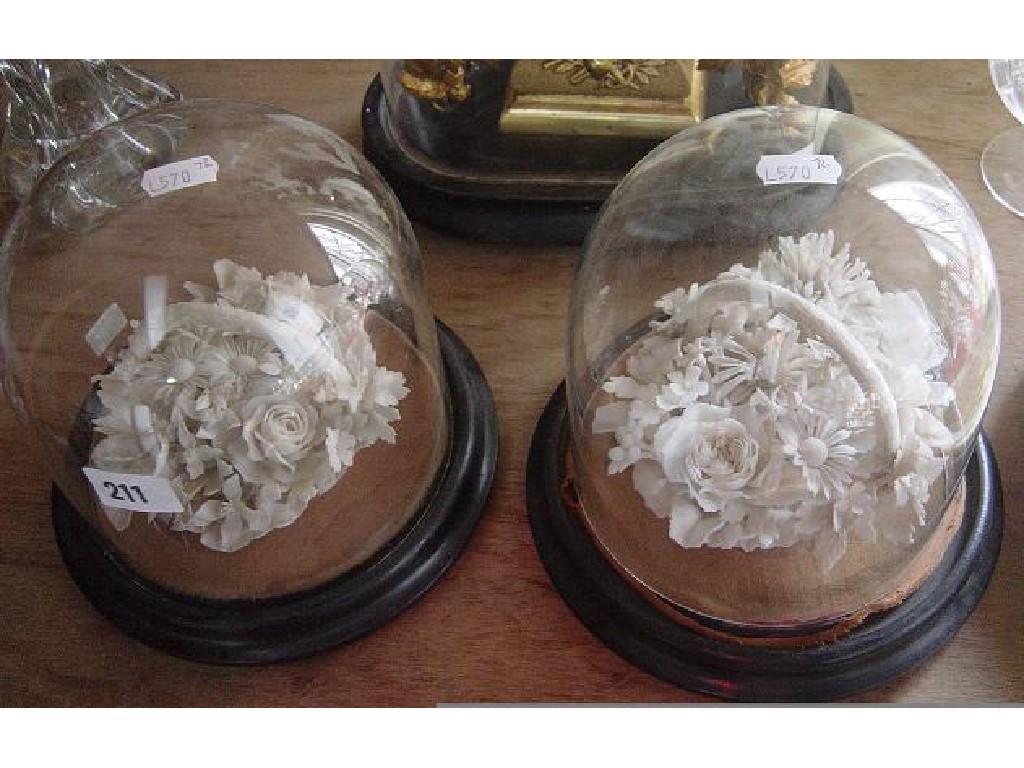 Appraisal: A pair of th century glass domes of circular form